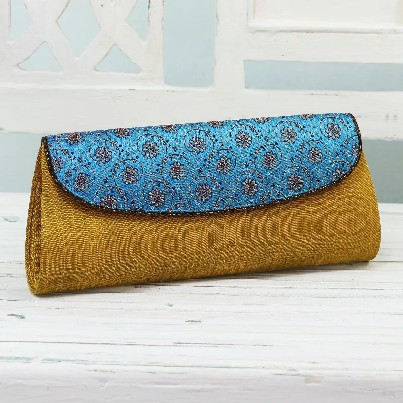 Amber Field Amber and Cyan Clutch Handbag with Floral Pattern from India